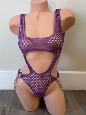 Club Exx x Dolls Kill Atomic Bliss bodysuit in purple fishnet with chain detail